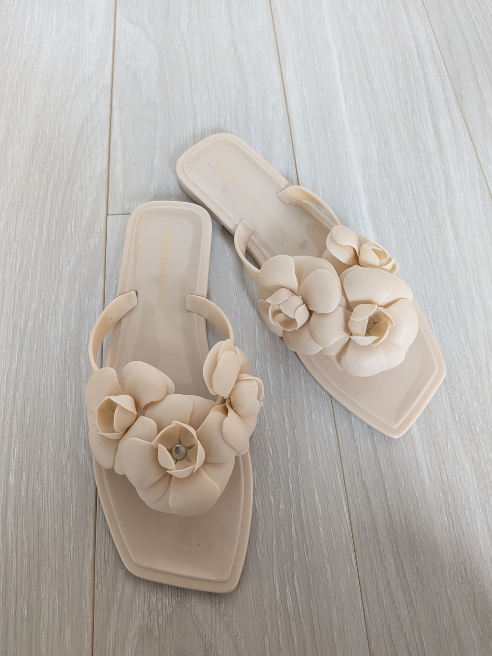 Brand new never worn BCBGeneration flower flip flops